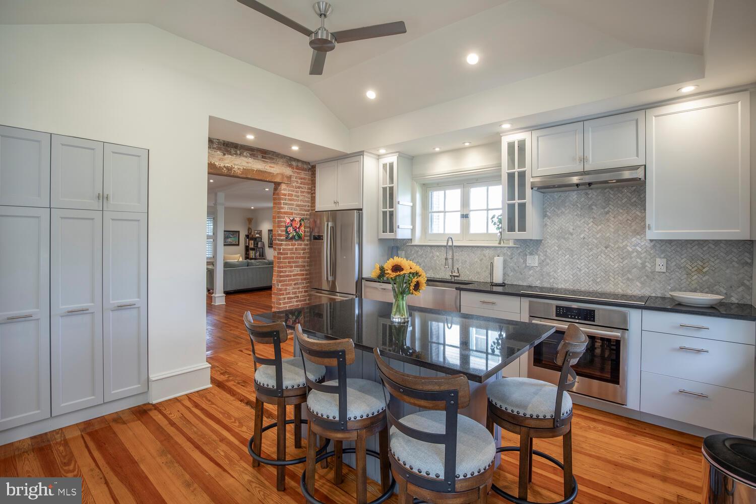 121 Cottage Street Doylestown, PA 18901 - Photo 8 of 46 a view of a dining room with furniture and wooden floor