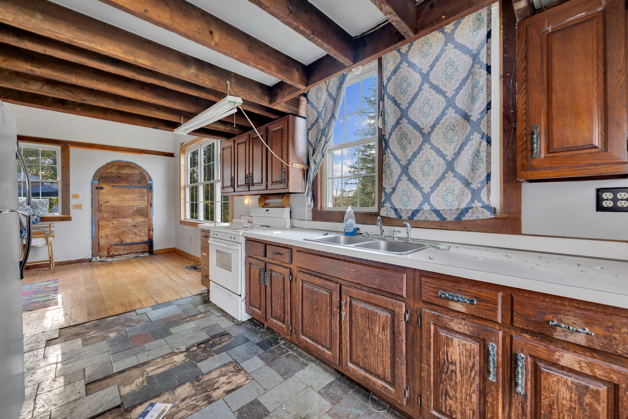 700 Bantam Road Litchfield, CT 06750 - Photo 24 of 40 a view of living room kitchen with a sink and dishwasher