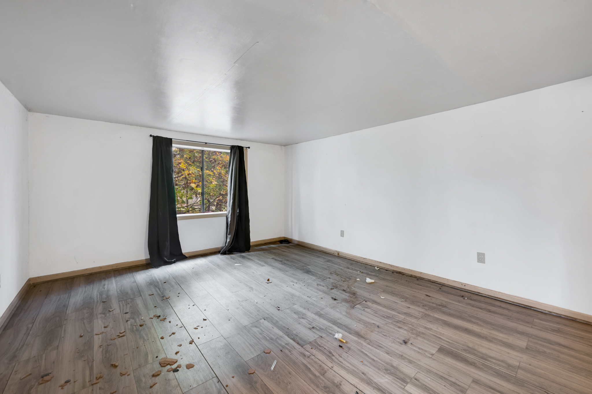 700 Bantam Road Litchfield, CT 06750 - Photo 30 of 40 an empty room with wooden floor and windows