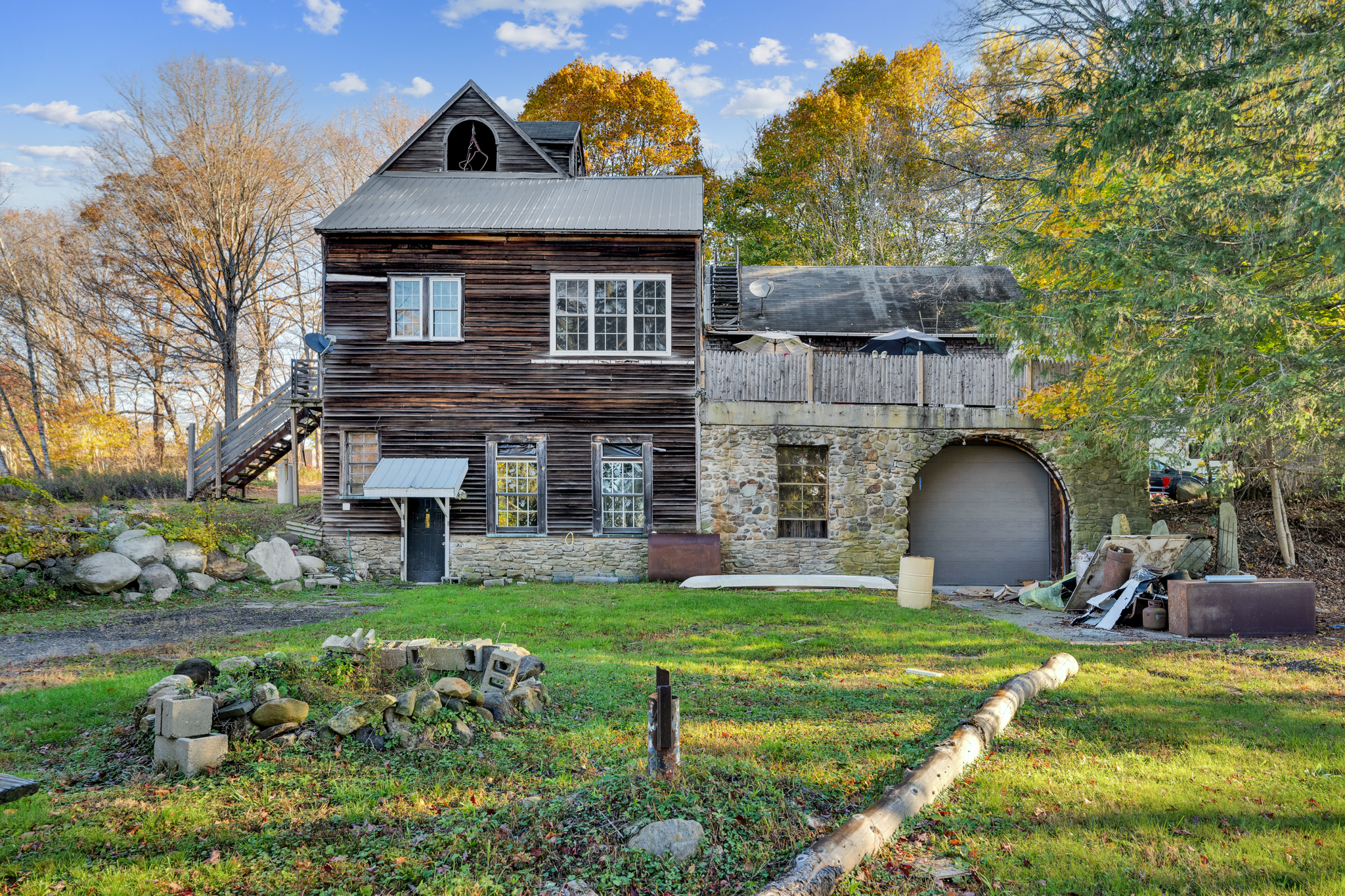 700 Bantam Road Litchfield, CT 06750 - Photo 8 of 40 a front view of a house with garden