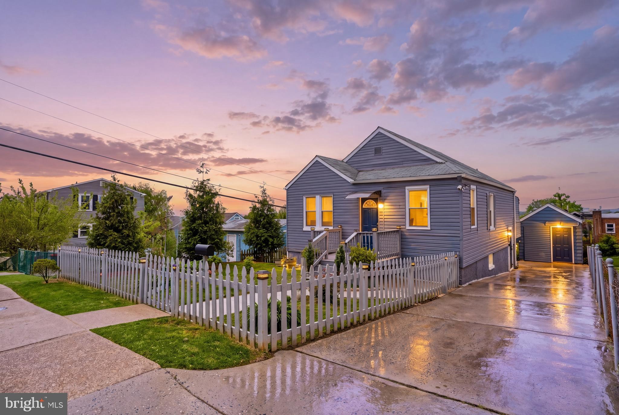 552 48th Street Baltimore, MD 21224 - Photo 2 of 29 a front view of house with yard and green space