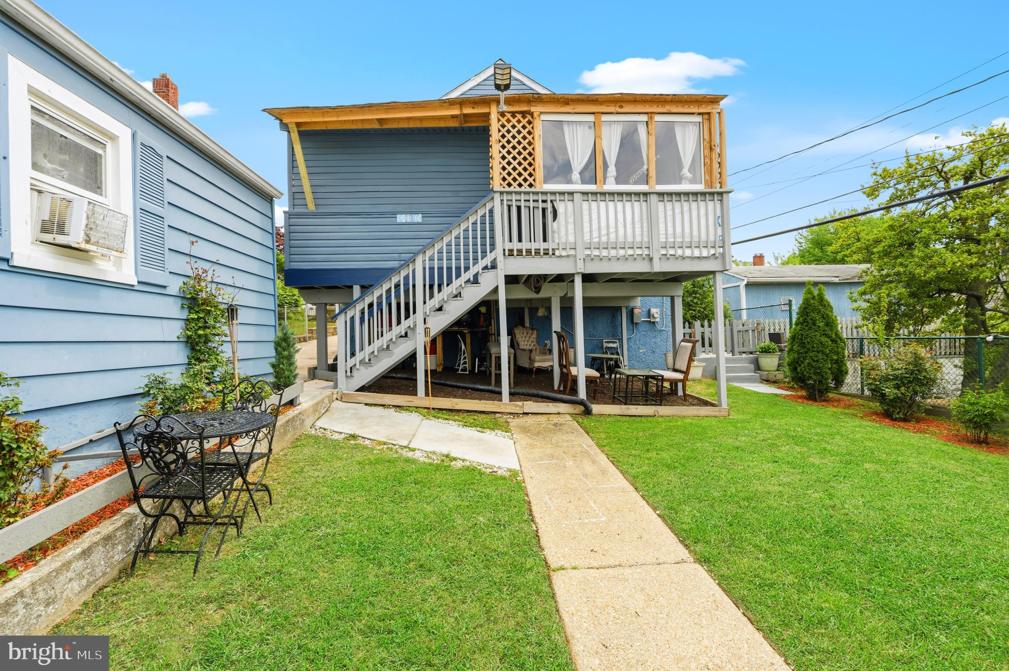 552 48th Street Baltimore, MD 21224 - Photo 28 of 29 a view of a house with a yard and sitting area