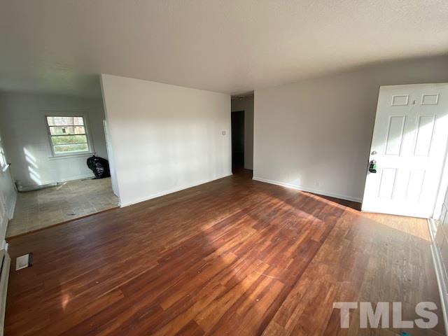 738 Woodland Road Raleigh, NC 27603 - Photo 2 of 9 This is den for 740 Woodland.