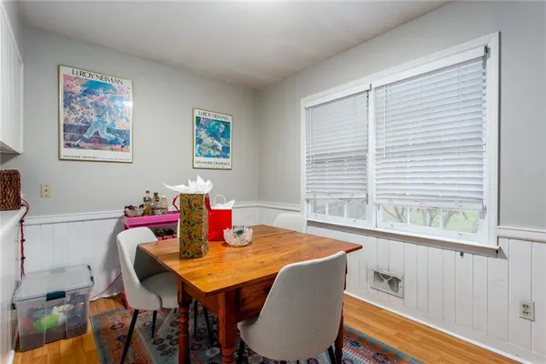 a view of a dining room with furniture window and outside view