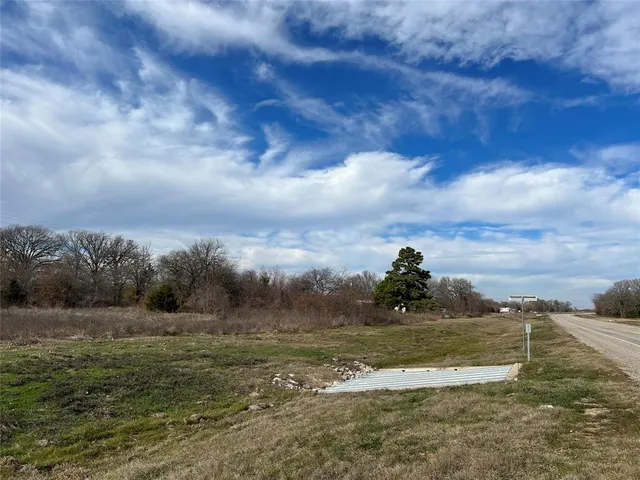 a view of city and green space