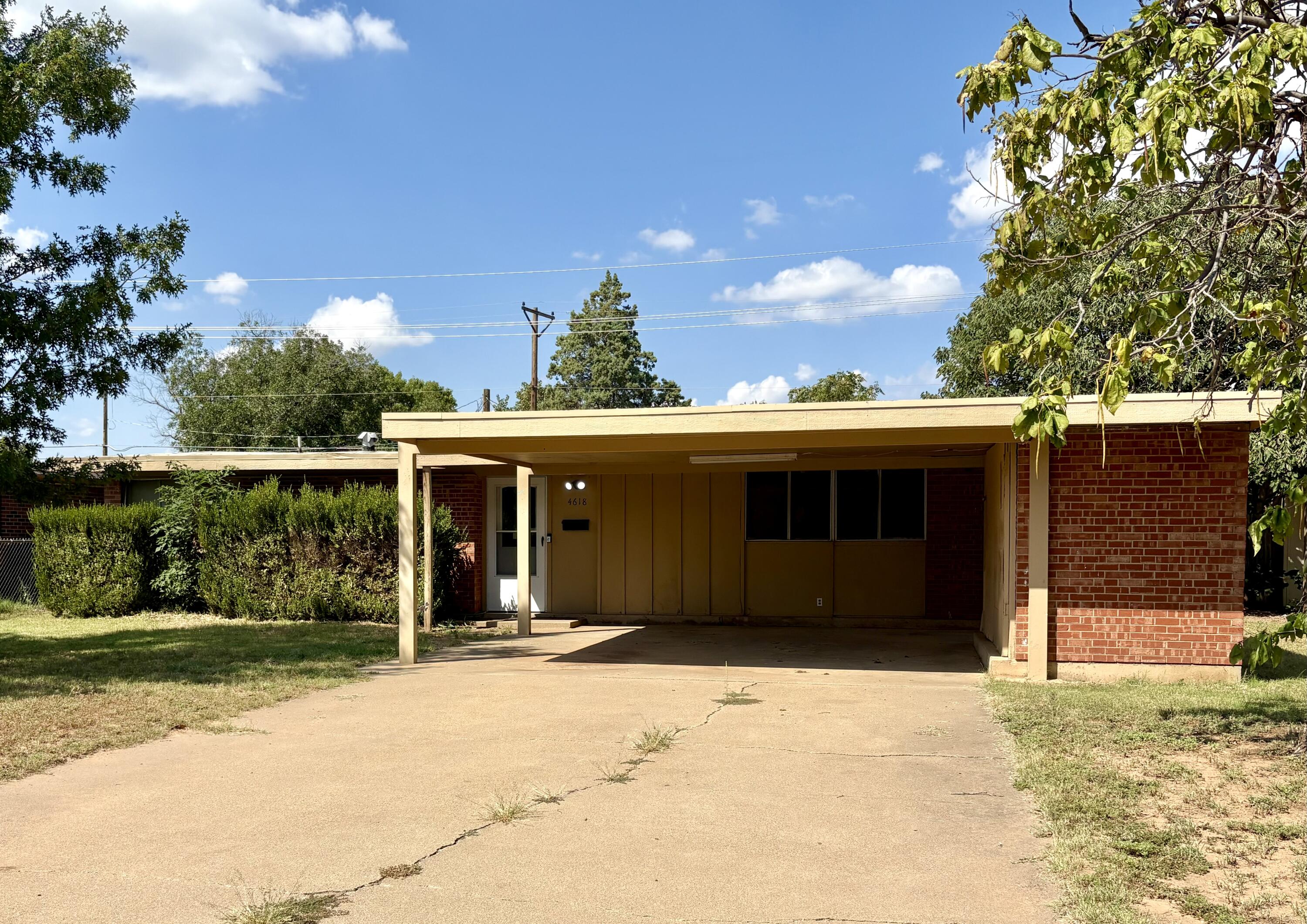 a front view of a house having yard