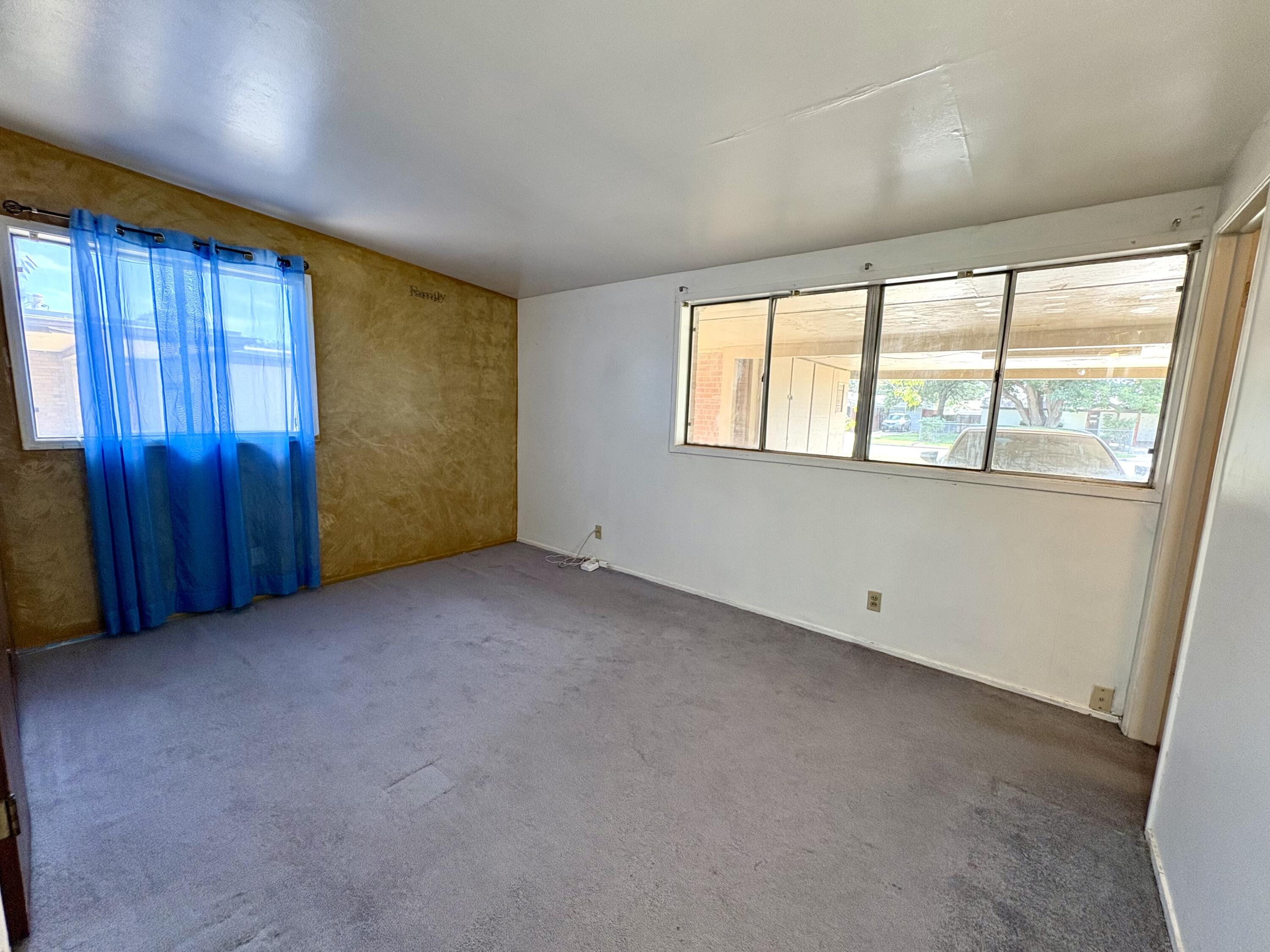 4618 44th Street Lubbock, TX 79414 - Photo 11 of 21 an empty room with windows