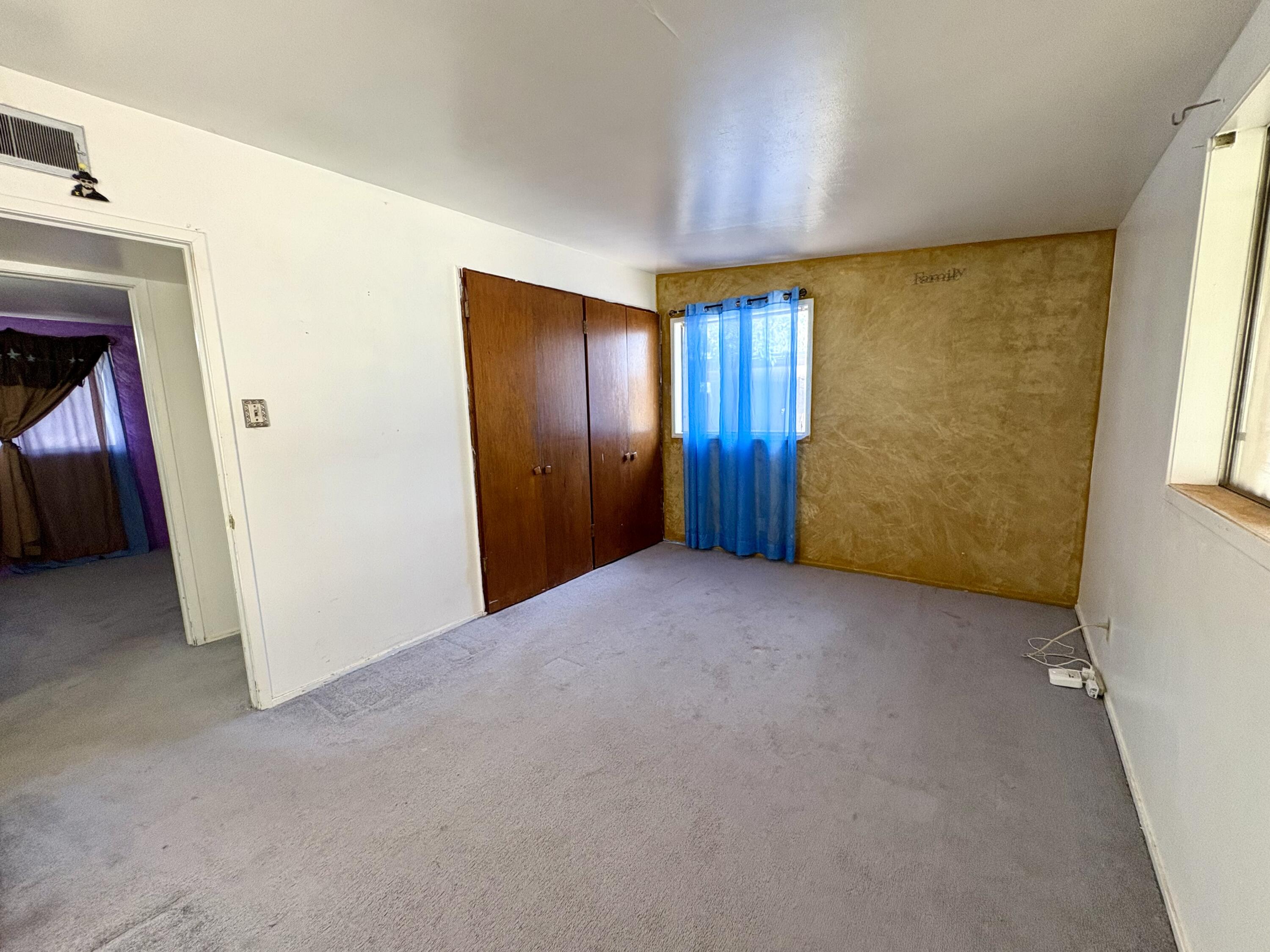 4618 44th Street Lubbock, TX 79414 - Photo 12 of 21 a view of empty room with windows