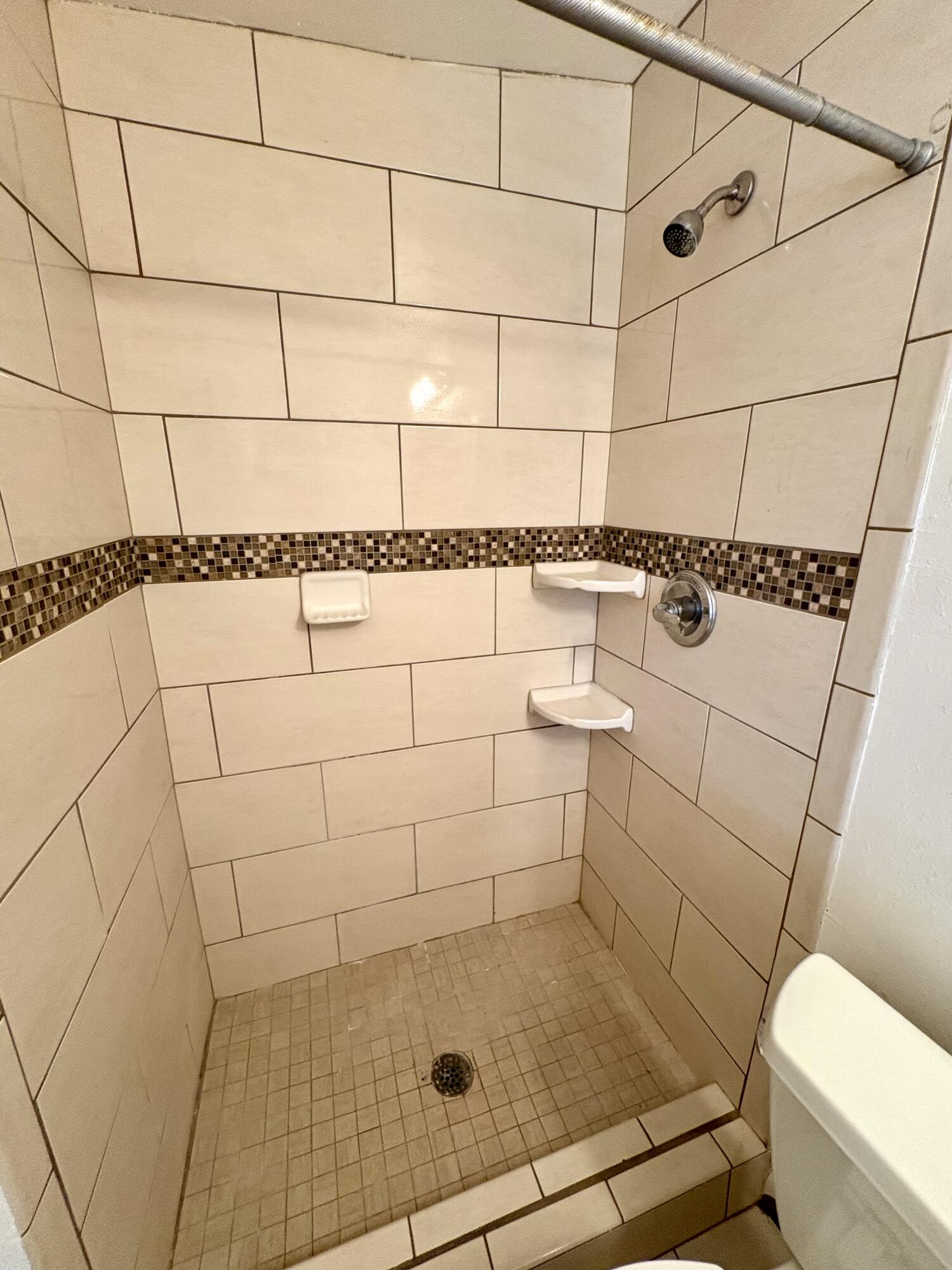 4618 44th Street Lubbock, TX 79414 - Photo 16 of 21 a bathroom with a shower