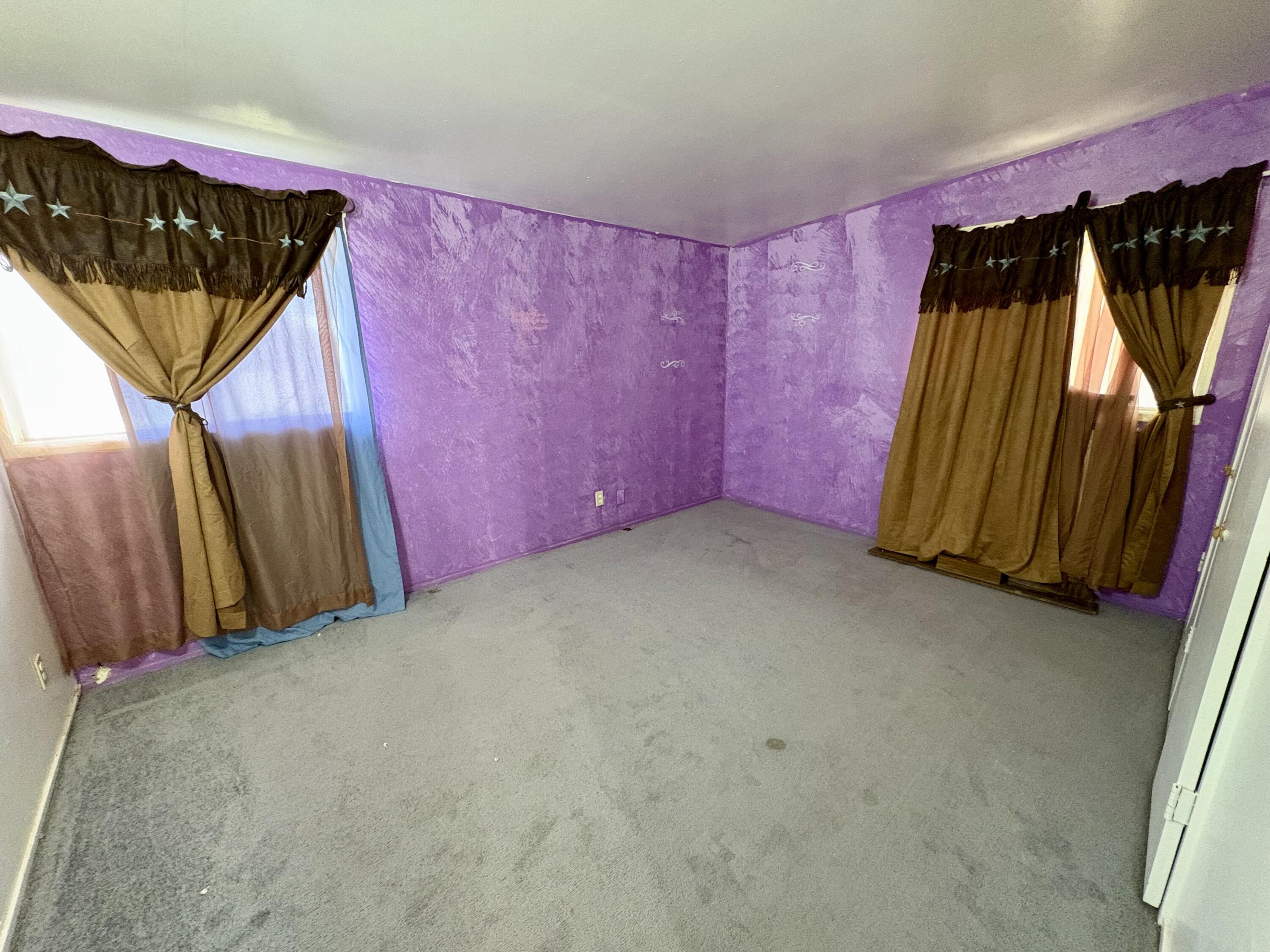 4618 44th Street Lubbock, TX 79414 - Photo 9 of 21 a view of a room with a door and a window