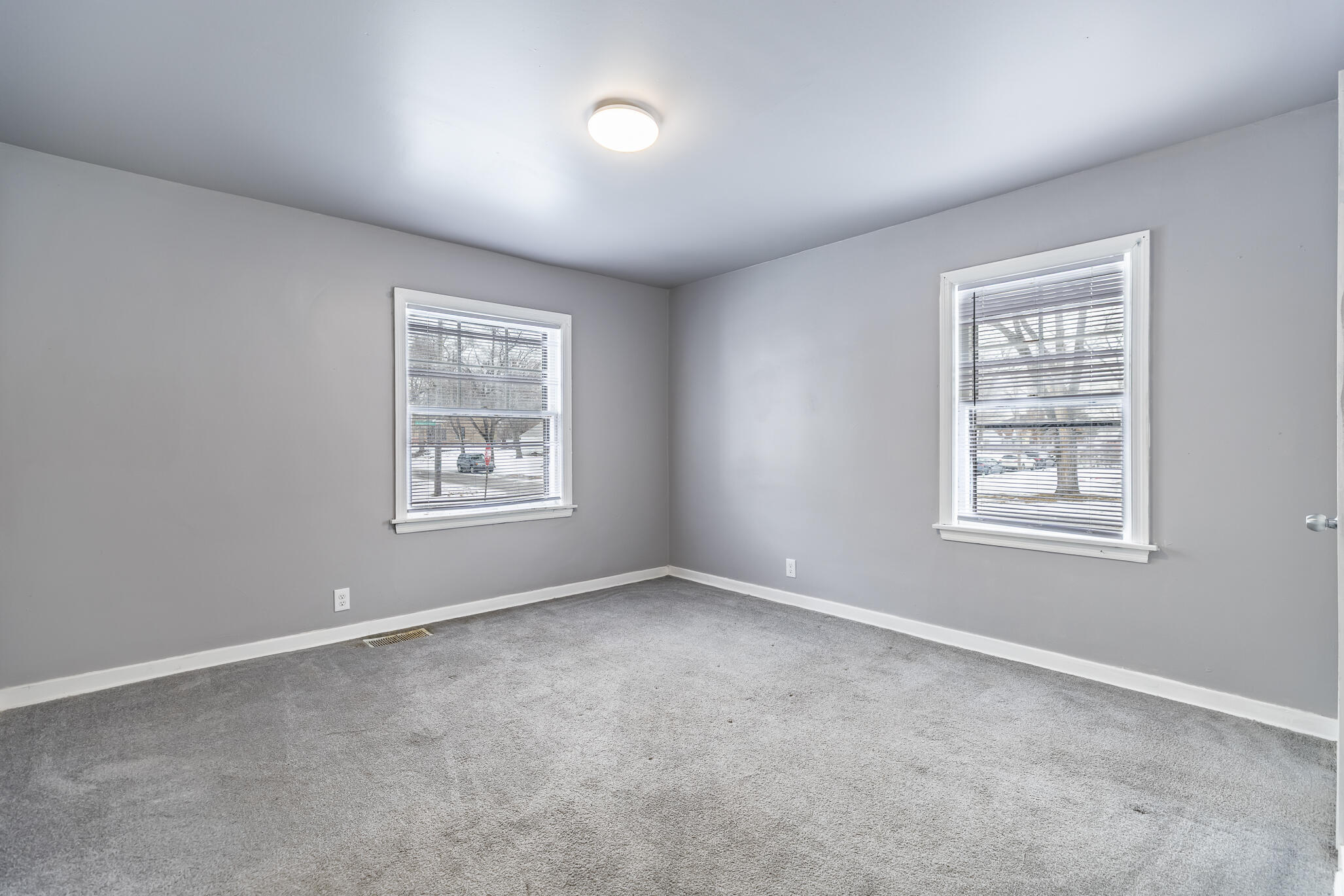 4601 Buchanan Street Gary, IN 46408 - Photo 14 of 27 a view of an empty room with a window