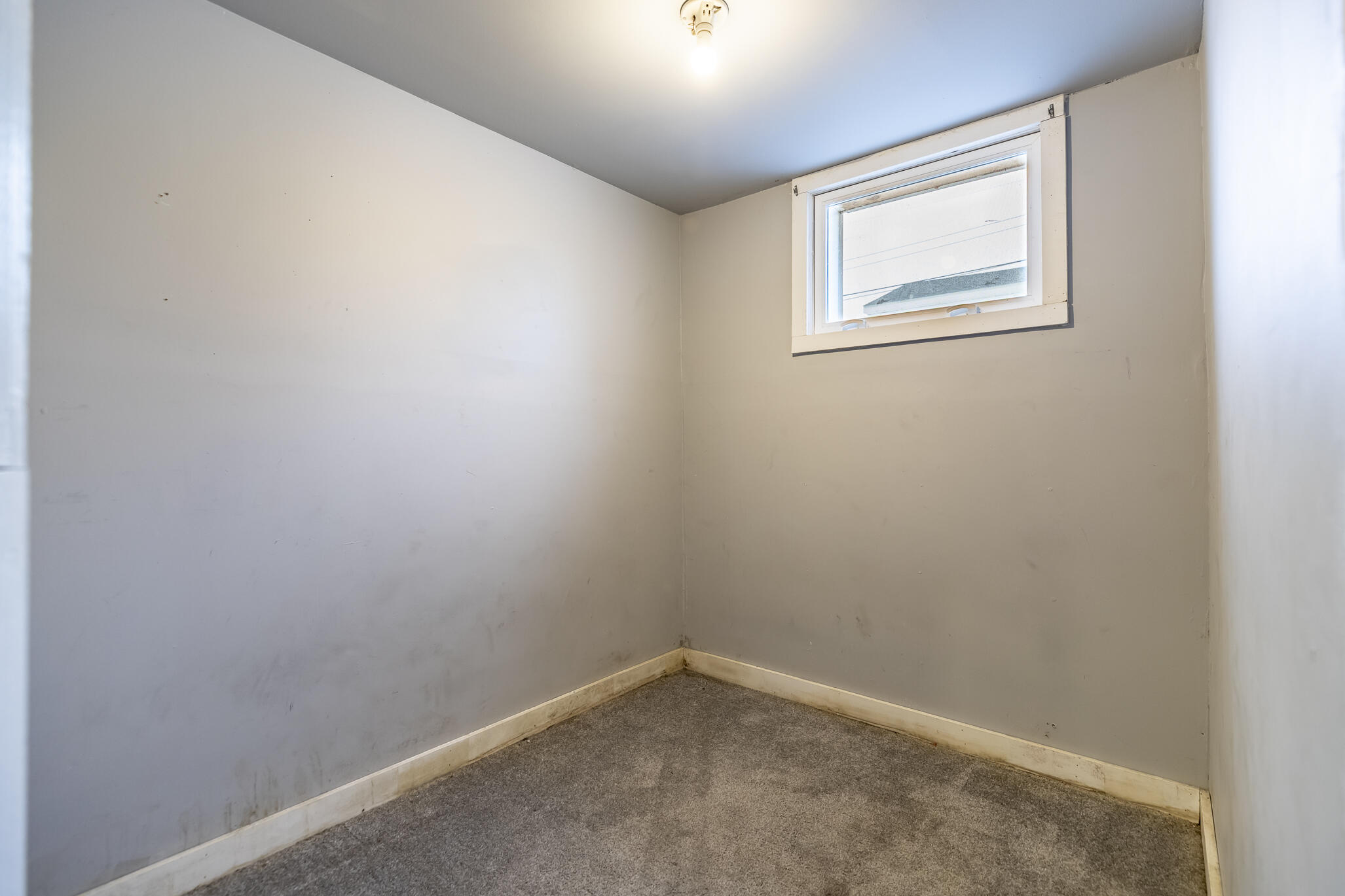 4601 Buchanan Street Gary, IN 46408 - Photo 20 of 27 an empty room with windows