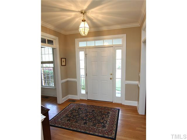 9404 Stone Mountain Road Raleigh, NC 27613 - Photo 3 of 25 Light/Bright Entry with Neutral Decor and Warm Hardwood Flooring! Foyer