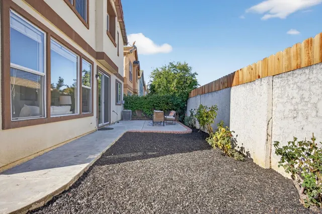 a view of a building with a yard