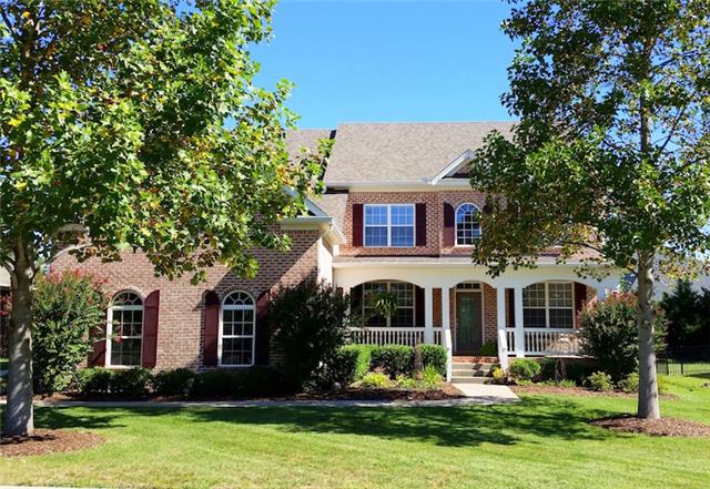 1226 White Rock Road Spring Hill, TN 37174 - Photo 1 of 20 a front view of a house with garden