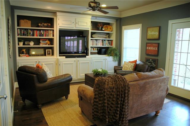 1226 White Rock Road Spring Hill, TN 37174 - Photo 11 of 20 a living room with furniture and a book shelf