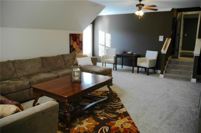 1226 White Rock Road Spring Hill, TN 37174 - Photo 14 of 20 a living room with furniture and a rug