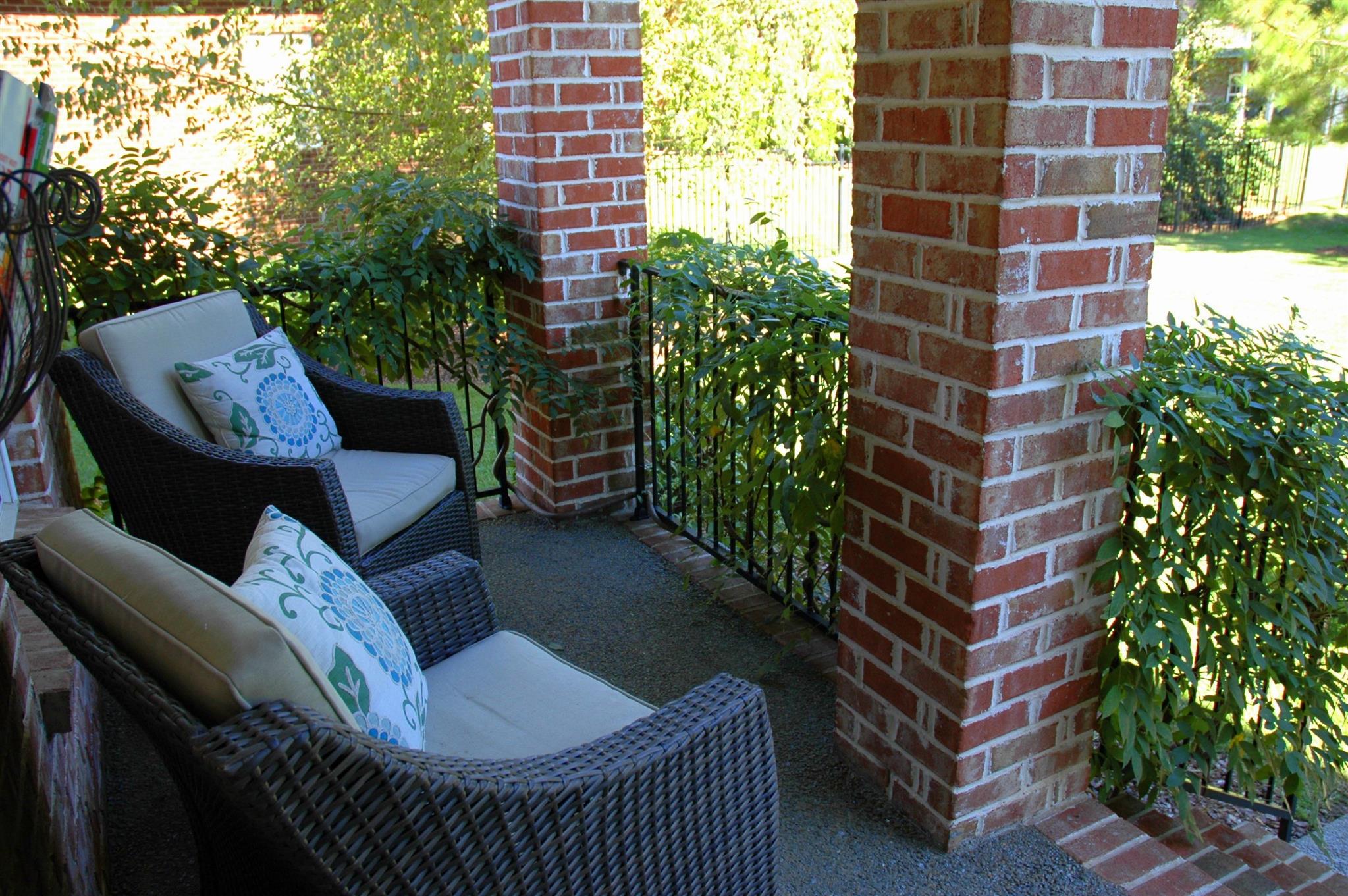 1226 White Rock Road Spring Hill, TN 37174 - Photo 19 of 20 a balcony with furniture and flowers