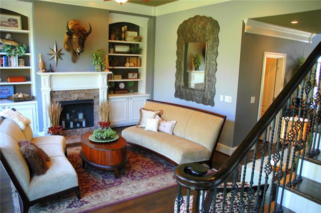 1226 White Rock Road Spring Hill, TN 37174 - Photo 5 of 20 a living room with furniture and a fireplace