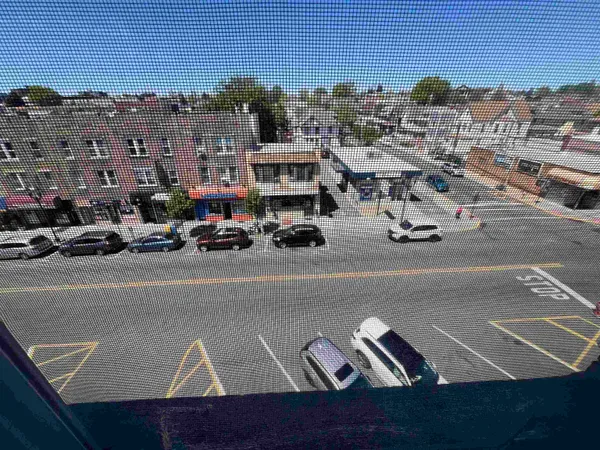 a view of a car park in front of a building