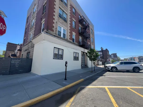 a front view of a house with glass windows