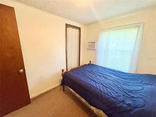 a view of a swimming pool with a yard