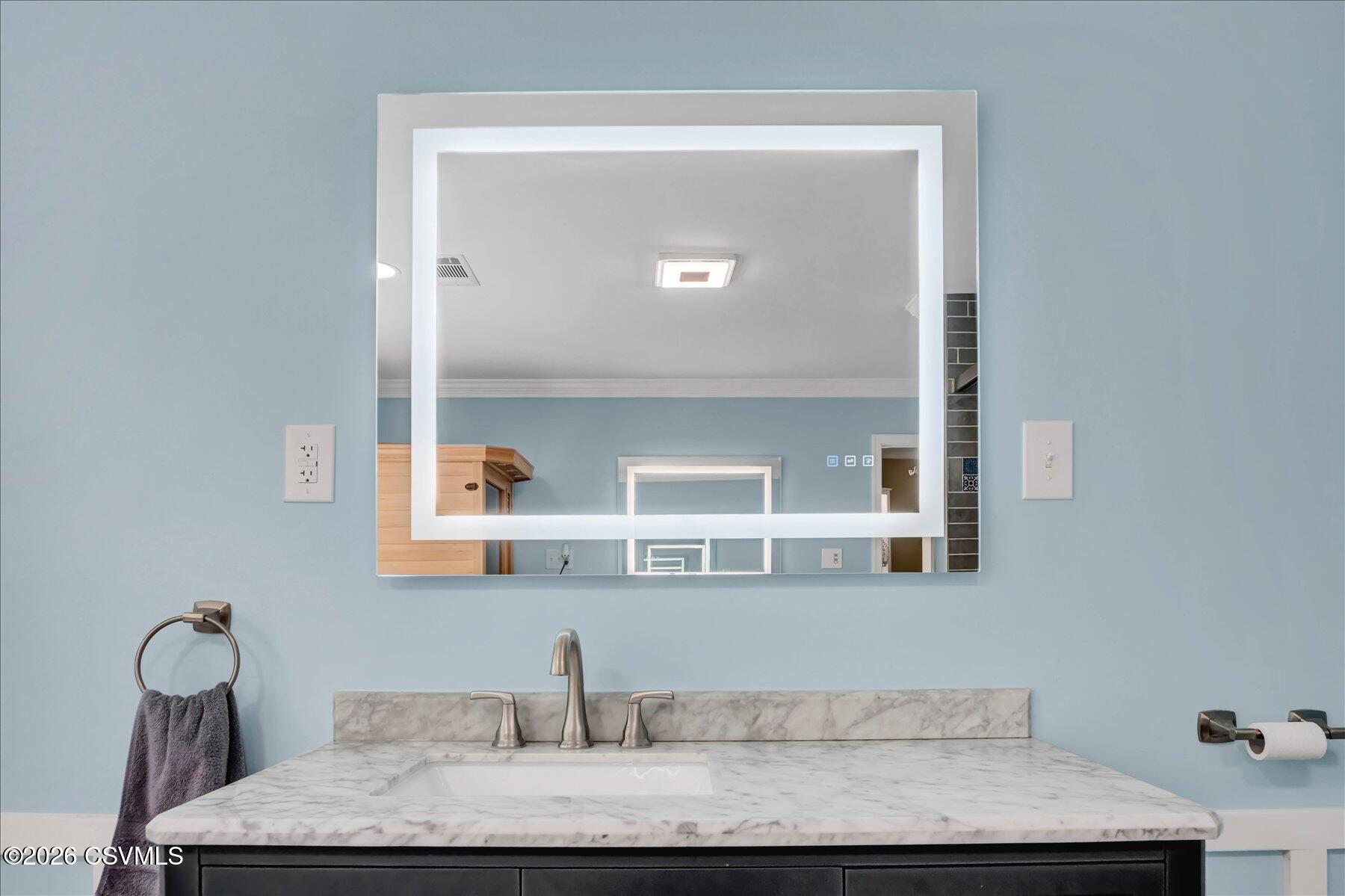 65 Crestview Drive Winfield, PA 17889 - Photo 30 of 70 a bathroom with a granite countertop sink and a mirror