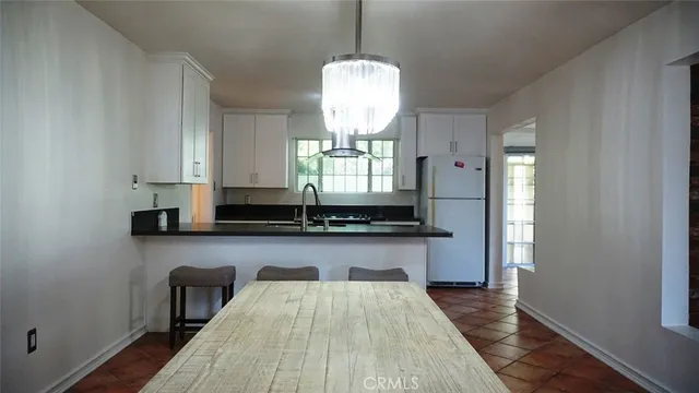 a room with wooden floor and window