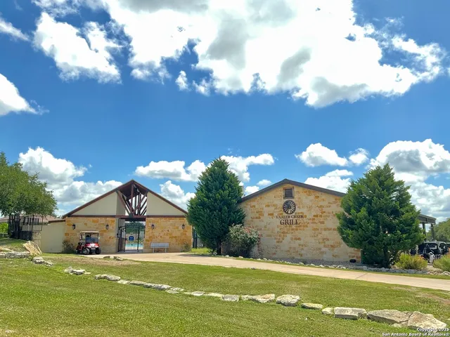 a view of a house with a big yard