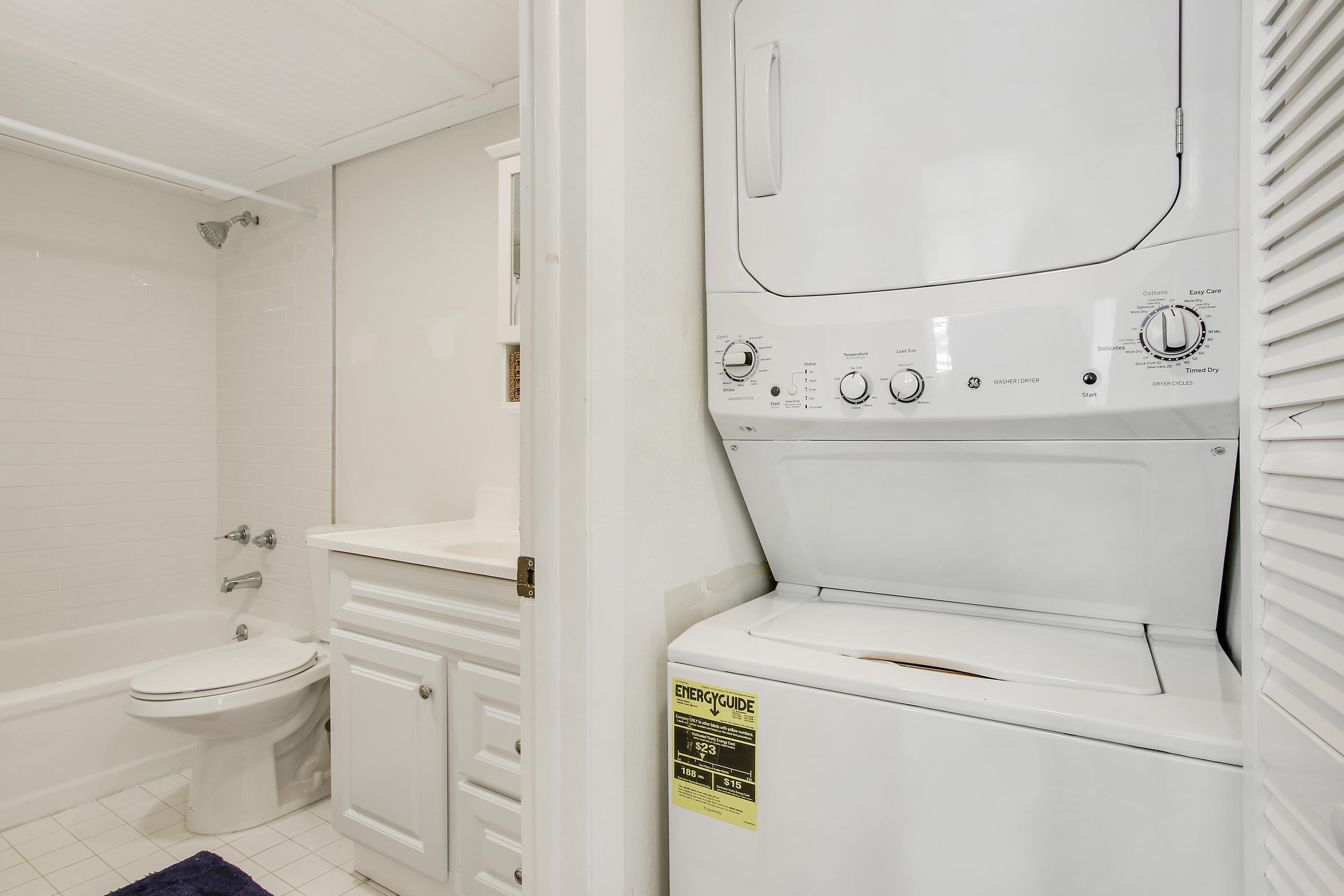 200 Ocean Trail Way, Unit 105 Jupiter, FL 33477 - Photo 19 of 22 a utility room with dryer and washer