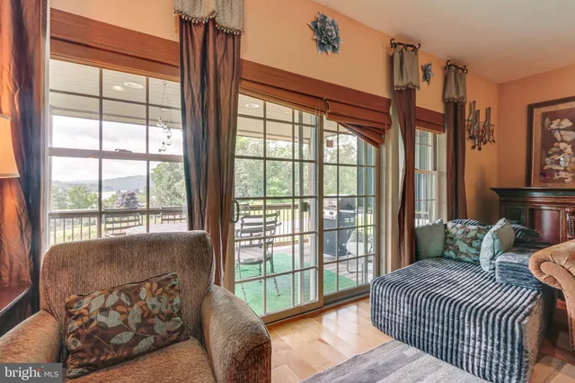 a bedroom with furniture and a window