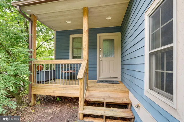 a view of front door and deck
