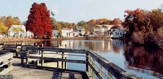 214 Ridge Road Milton, DE 19968 - Photo 14 of 19 a terrace with outdoor seating and lake view