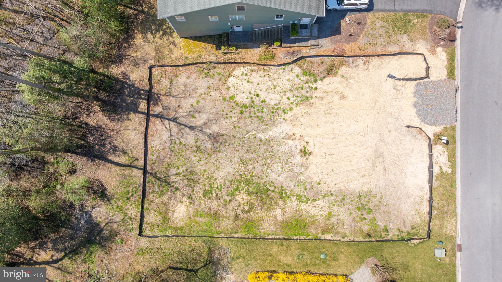214 Ridge Road Milton, DE 19968 - Photo 7 of 19 a picture of a bathroom with a sink and a mirror