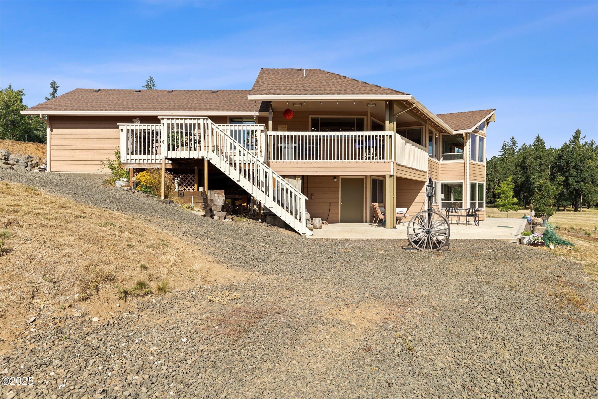 21560 Gooseneck Road Sheridan, OR 97378 - Photo 1 of 63 a front view of a house with a yard