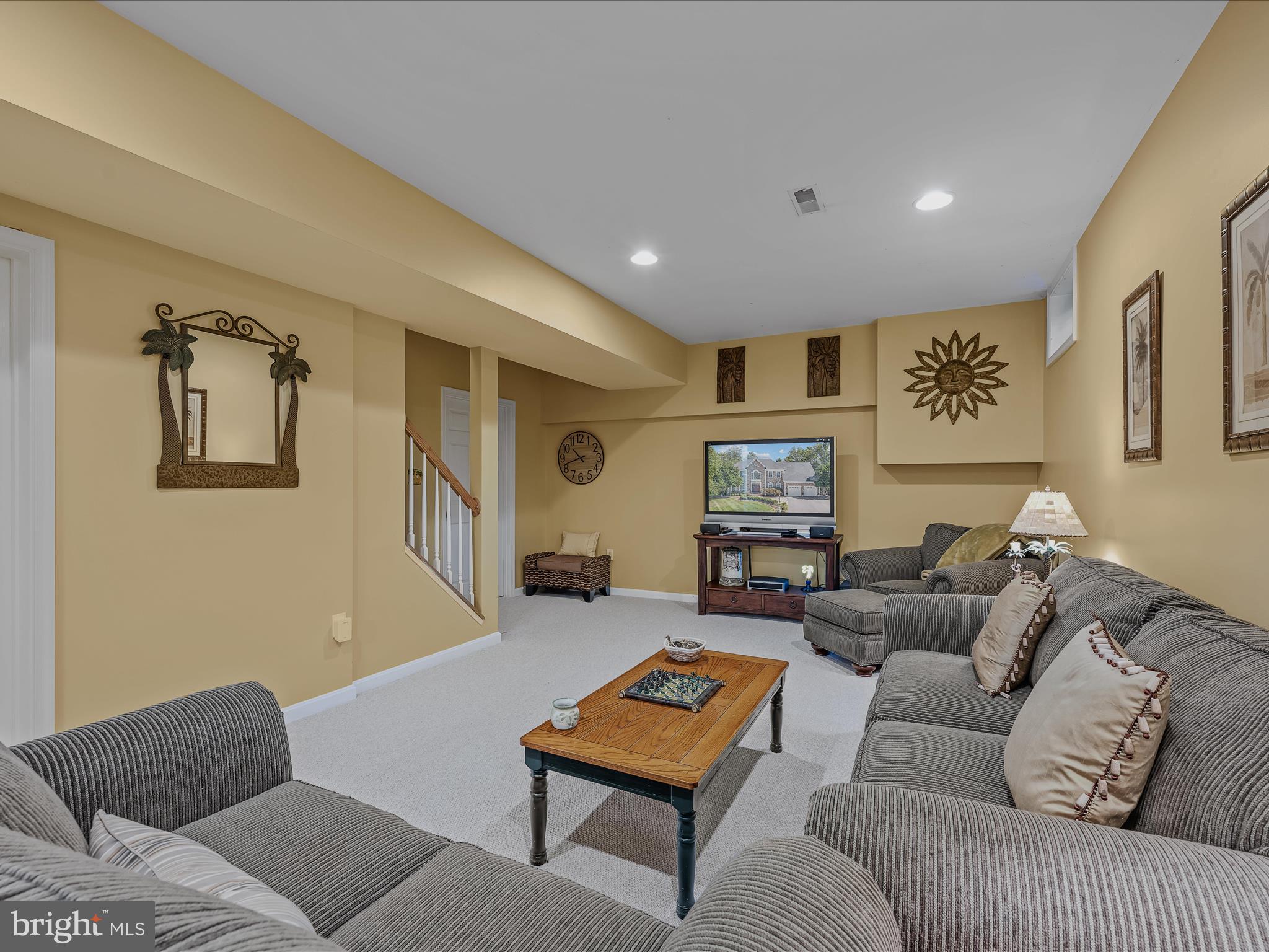 884 Rivanna Run Falling Waters, WV 25419 - Photo 48 of 94 a living room with furniture and a couch
