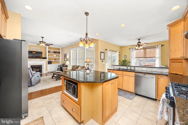 a view of a room with a floor to ceiling window and an outdoor view