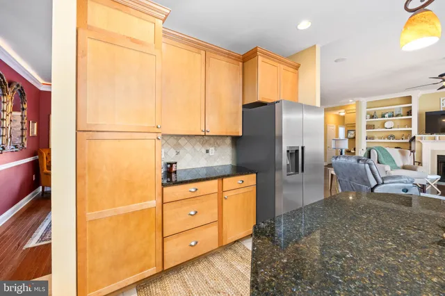 a bedroom with a bed and a lamp