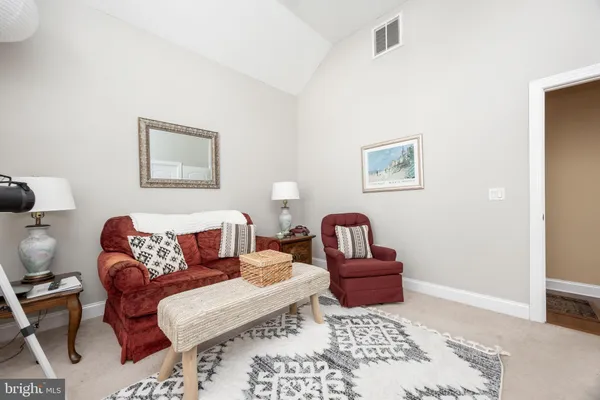 a view of garage yard and front view of a house
