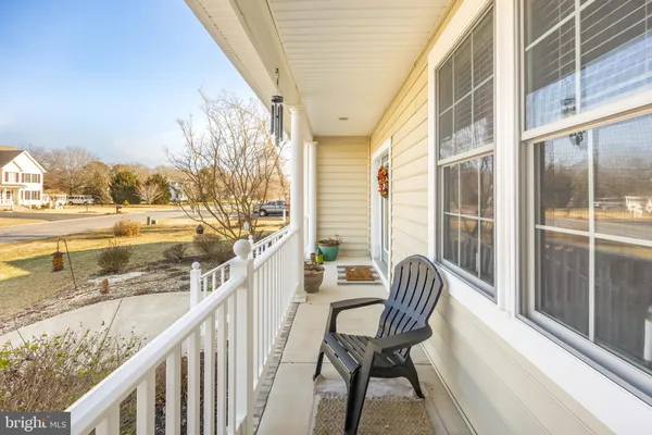 a living room with furniture fireplace and a flat screen tv