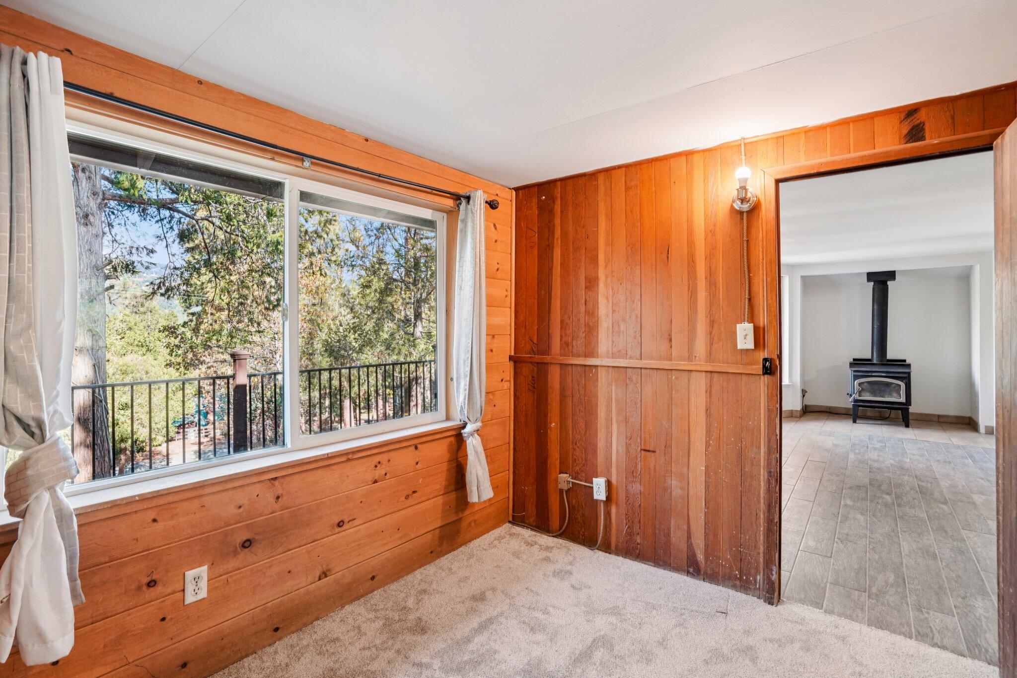 53451 Middleridge Drive Idyllwild, CA 92549 - Photo 14 of 29 a view of hallway with a large window and wooden floor