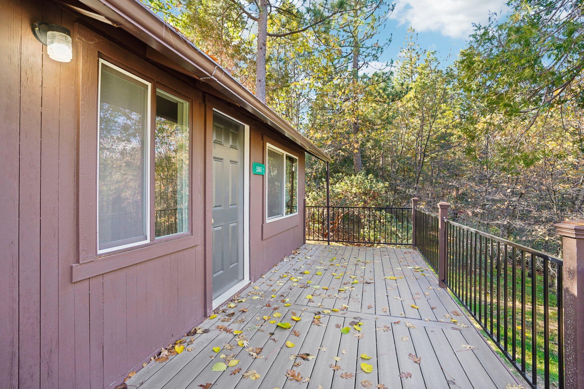 53451 Middleridge Drive Idyllwild, CA 92549 - Photo 29 of 29 a view of a balcony with wooden floor and fence