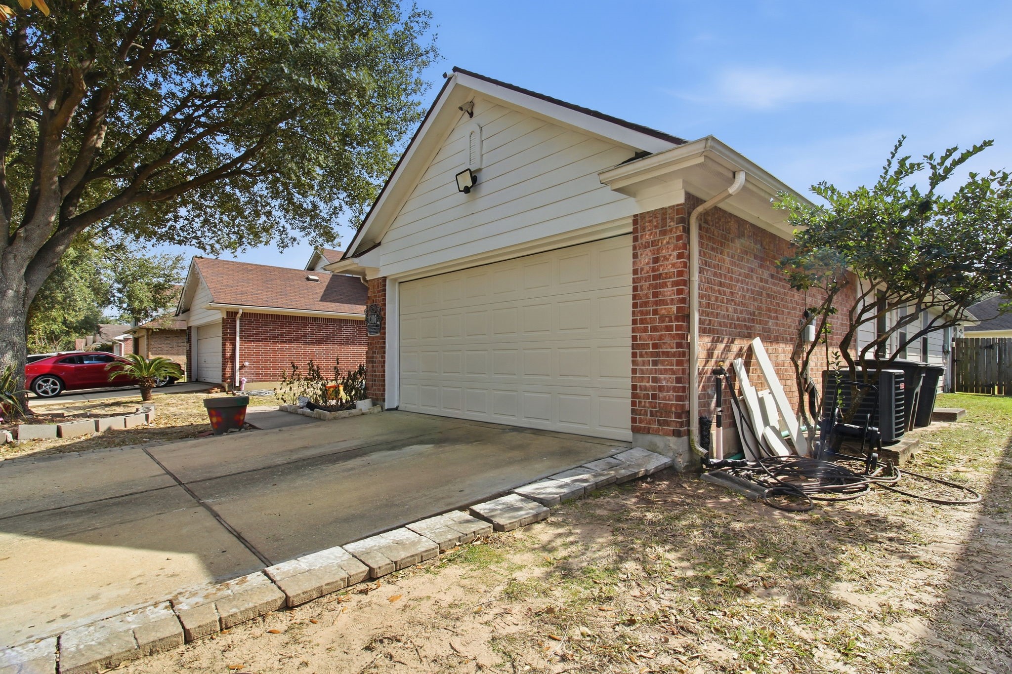 13106 Cherryglade Court Houston, TX 77044 - Photo 3 of 26 a view of a house with a patio
