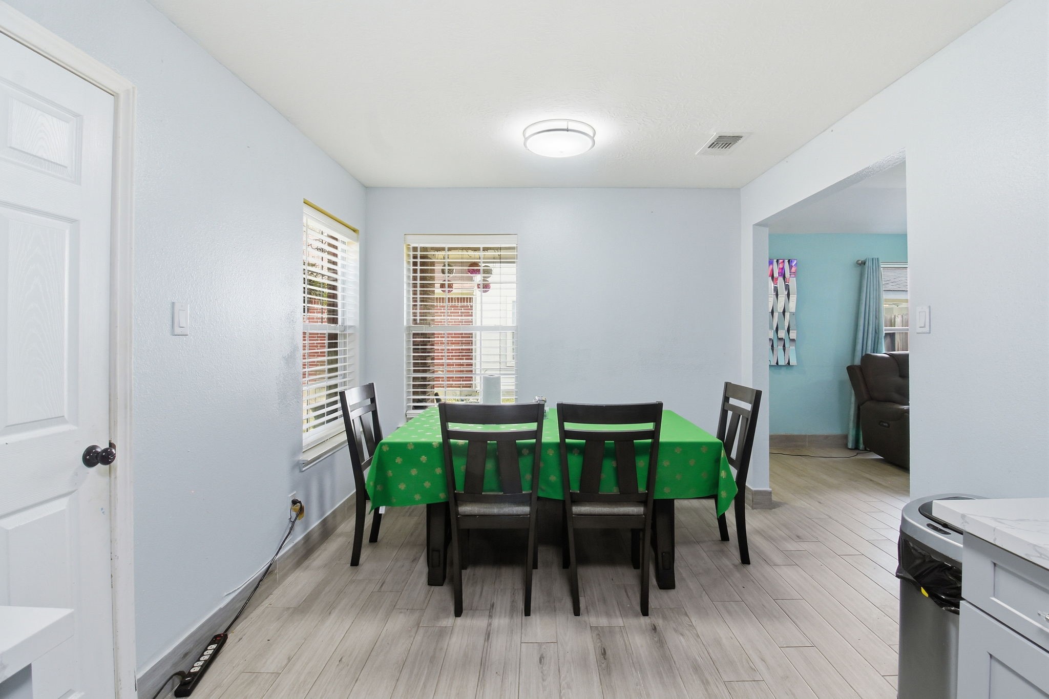 13106 Cherryglade Court Houston, TX 77044 - Photo 6 of 26 a view of a dining room with furniture and a window