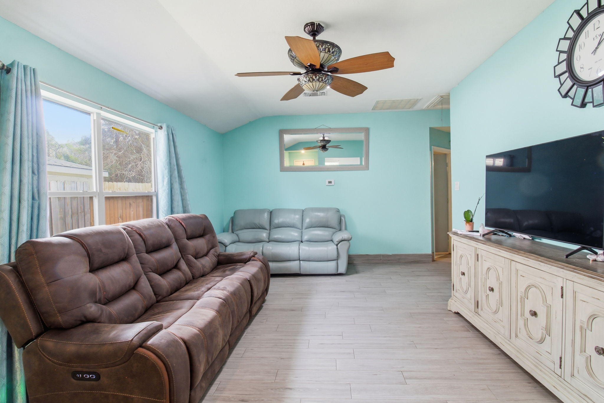 13106 Cherryglade Court Houston, TX 77044 - Photo 8 of 26 a living room with furniture and a flat screen tv