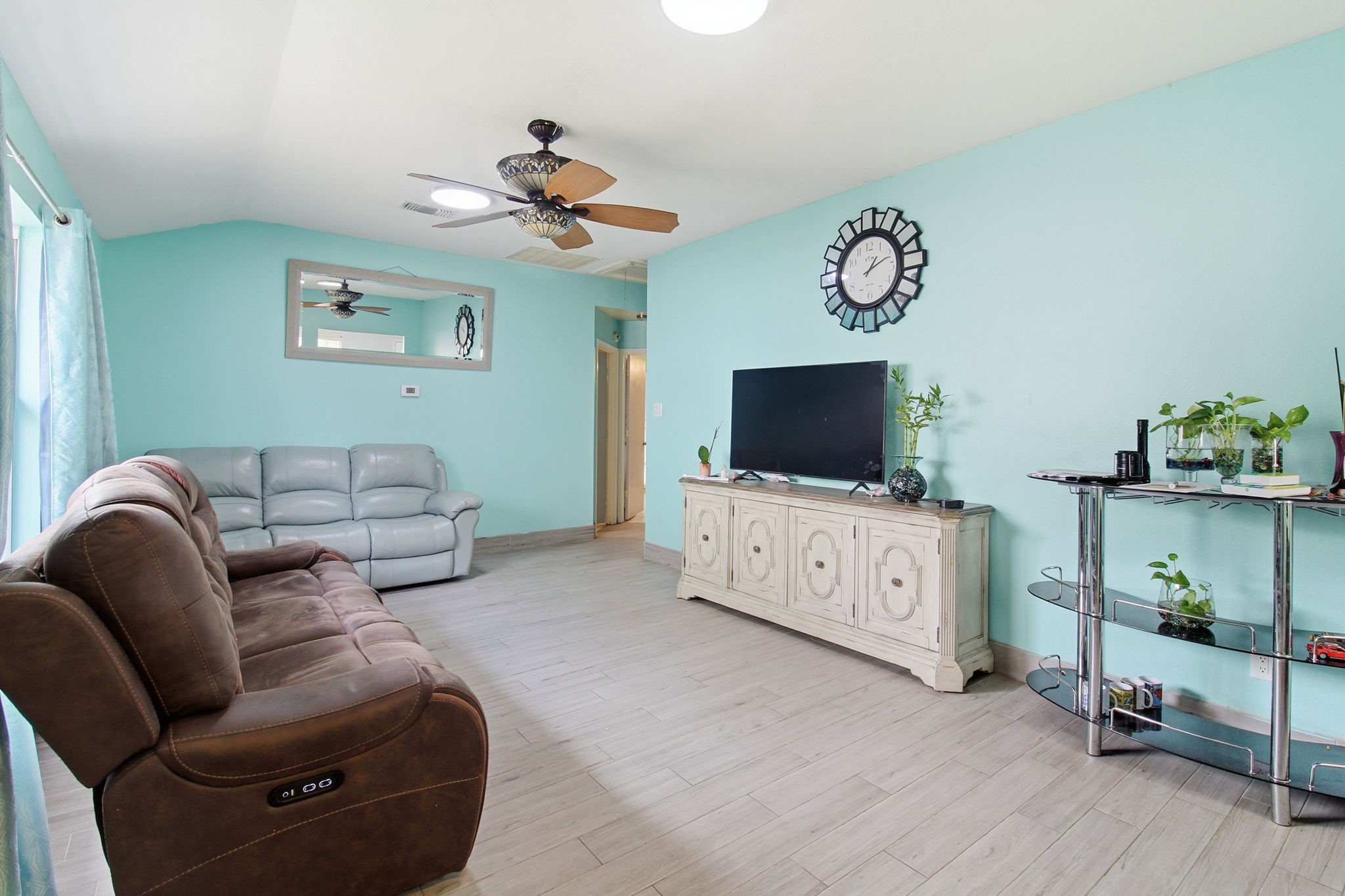 13106 Cherryglade Court Houston, TX 77044 - Photo 9 of 26 a living room with furniture and a flat screen tv