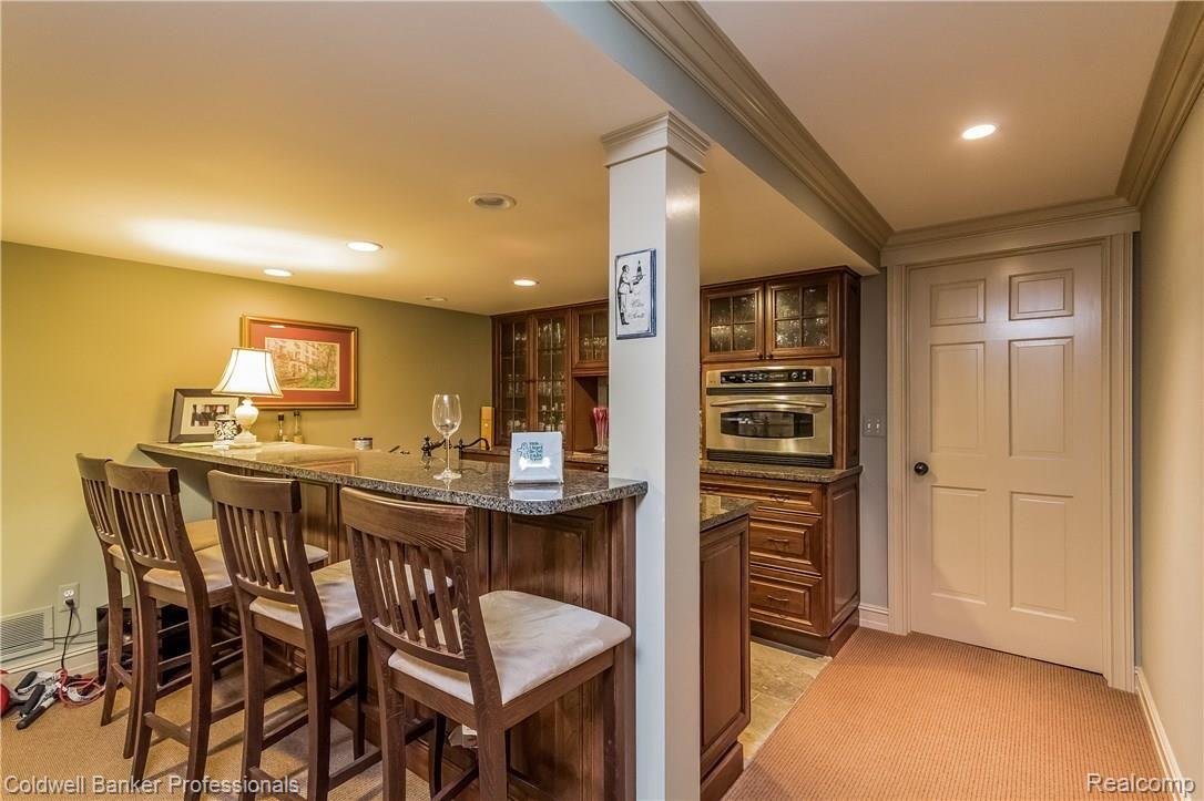 1425 Pebble Ridge Drive Rochester, MI 48307 - Photo 32 of 43 052-Wet_Bar_in_Lower_Level-1829964-large.jpg