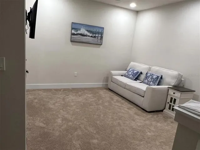 a living room with furniture and a couch