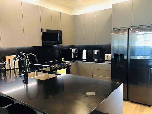 a view of a living room and dining room