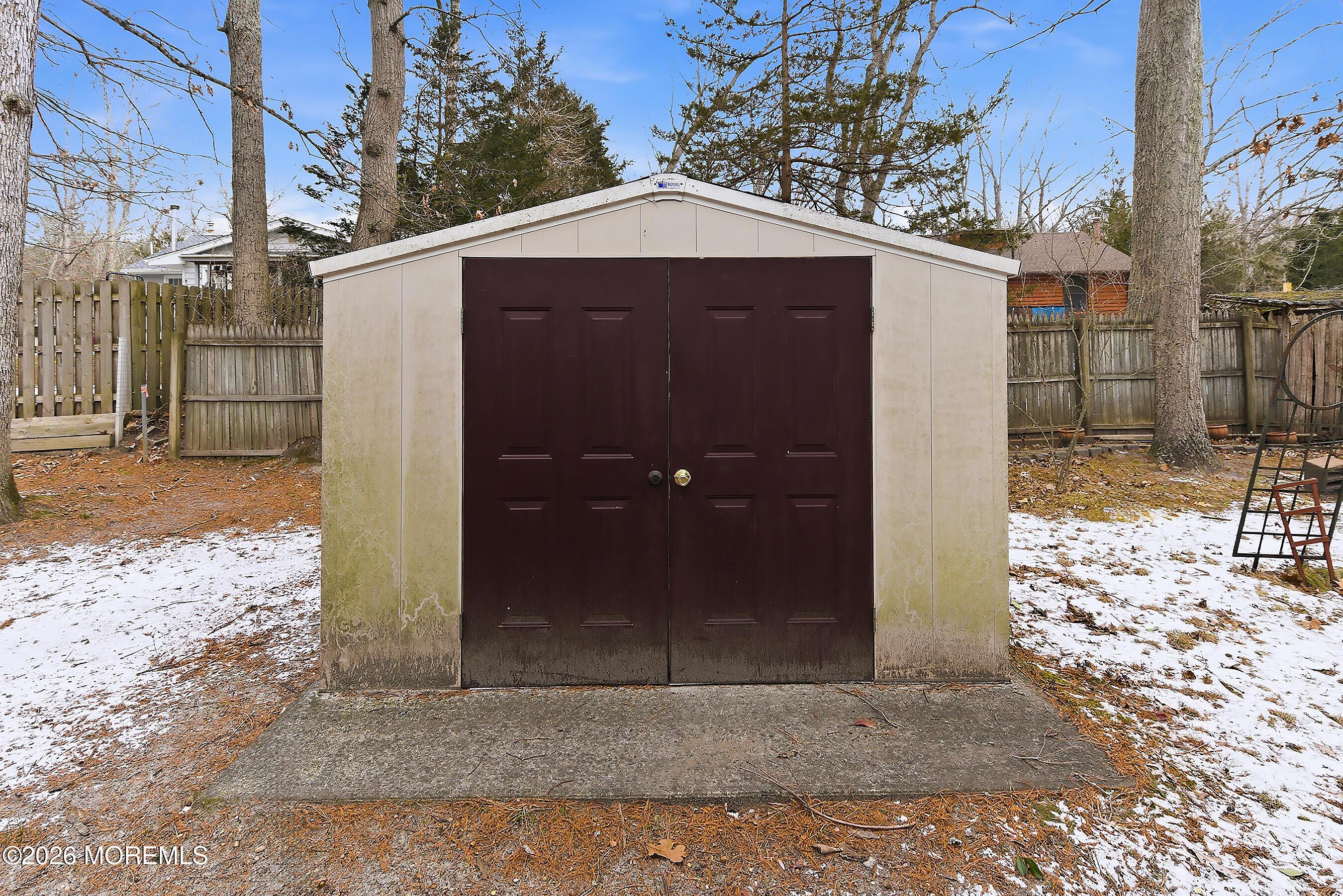 6 Loblolly Lane Jackson, NJ 08527 - Photo 18 of 20 a yellow house with a outdoor space